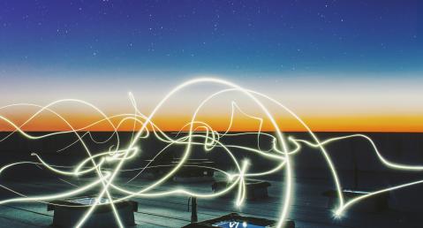 adelphi theme energy, roof with night sky and light beams