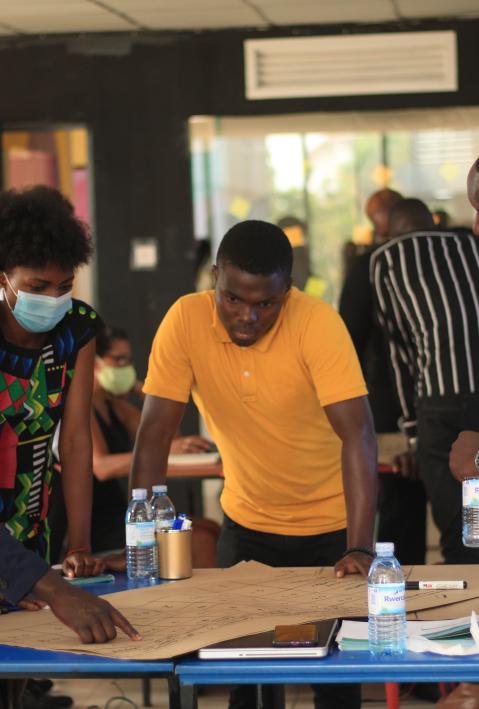 green entrepreneurs in Uganda discussing workshop results 