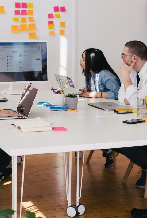 People brainstorming with notes.