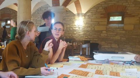 Researchers plan and discuss at the table