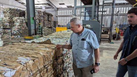 adelphi staff member checking the stacking of rubbish